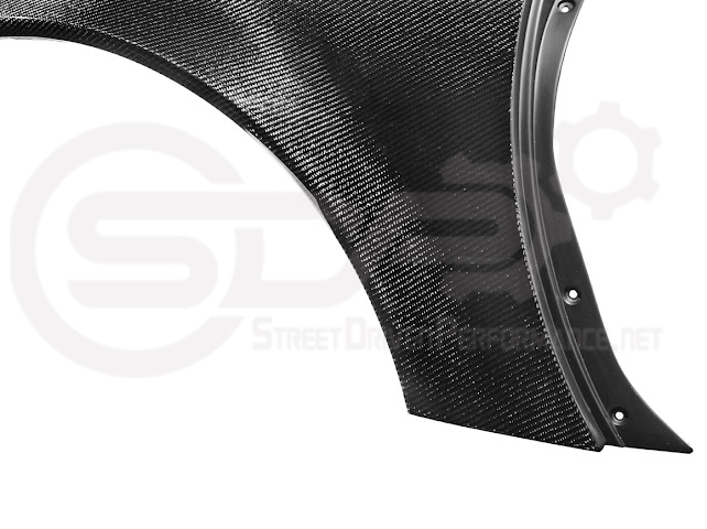 Factory style carbon fiber front and rear widebody fenders for 1997-2004 Chevrolet Corvette C5 by Street Driven Performance.