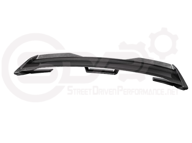 Dark Horse style carbon fiber rear wickerbill spoiler wing on a 2015-2023 Ford Mustang, installed on the car's trunk.