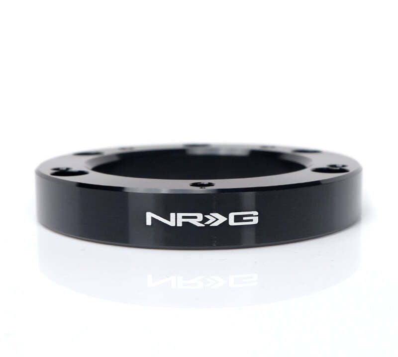 NRG 6 hole to 5 hole steering wheel hub adapter showing metal hub with bolt holes for car steering wheel installation
