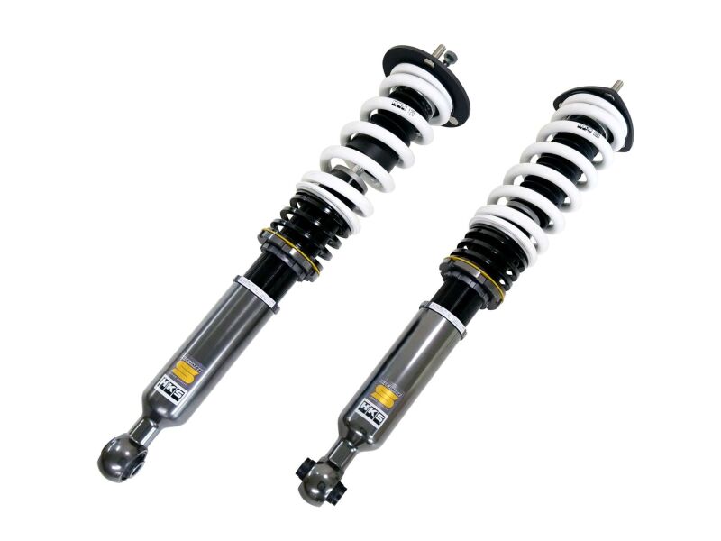 HKS Hipermax S coilover kit for GSE21/GRS204 RWD car, showing adjustable shock absorbers and coil springs in a close-up view.