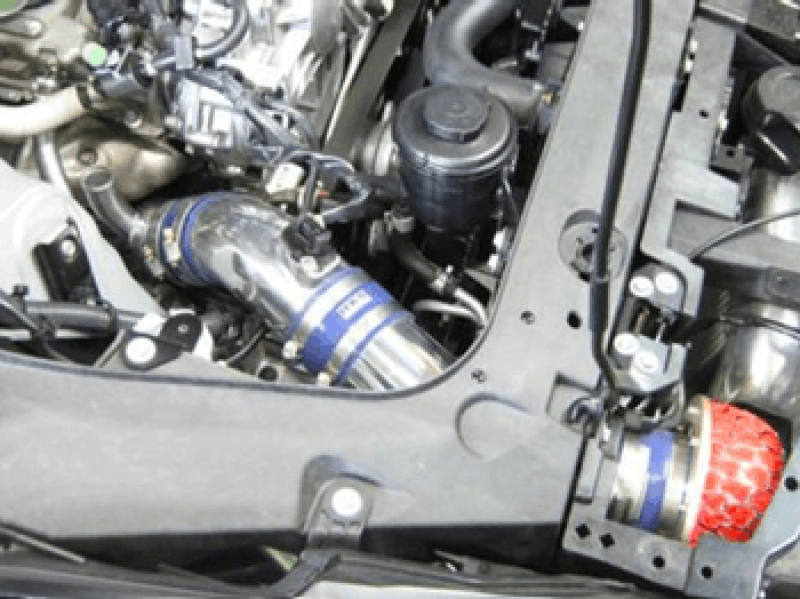 HKS turbine suction cold air intake kit for Nissan R35 GTR, featuring black hoses and metallic components for enhanced airflow.