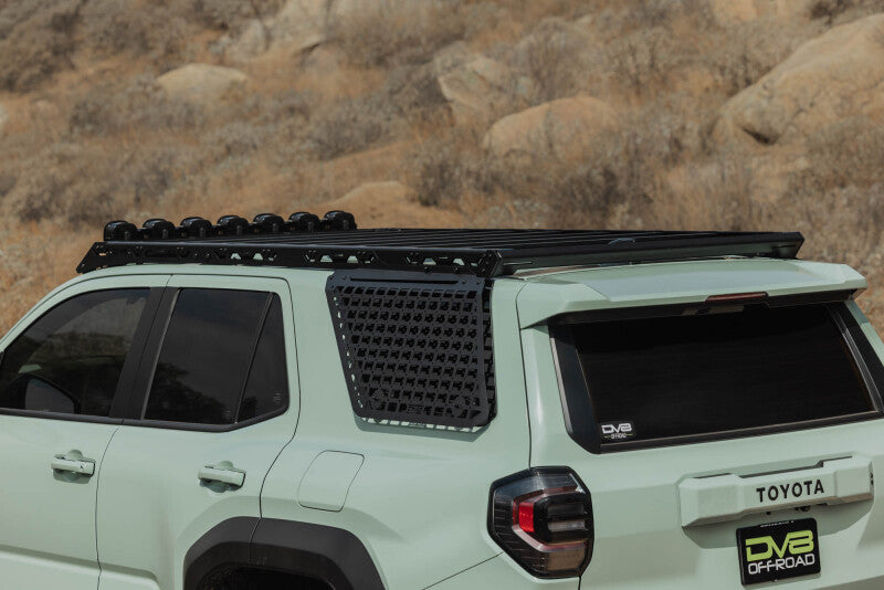 DV8 Offroad Toyota 4Runner exterior window Molle panel for DV8 roof rack on driver side, made of durable exterior trim material.