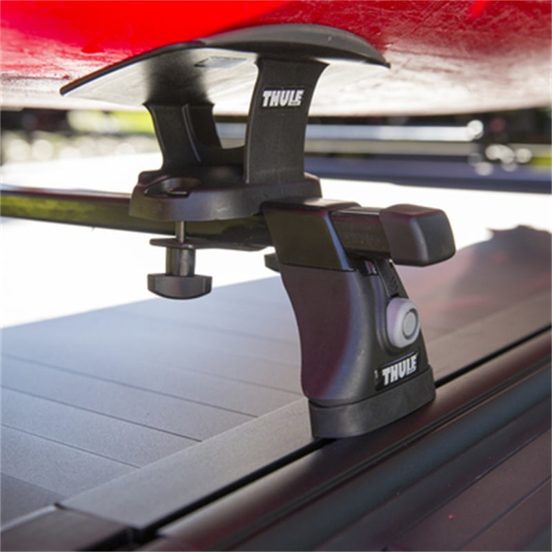 Pace Edwards Ultragroove retractable tonneau cover on Nissan Titan King Cab truck bed, showing the sleek, durable design.