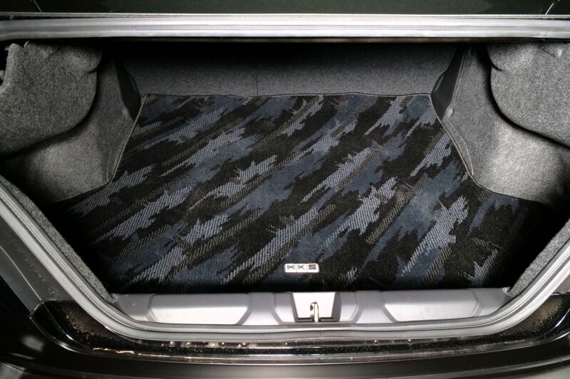 HKS carpeted floor mats full set for VB model, driver and passenger side, in an Oct LHD vehicle, showing textured surface and branding