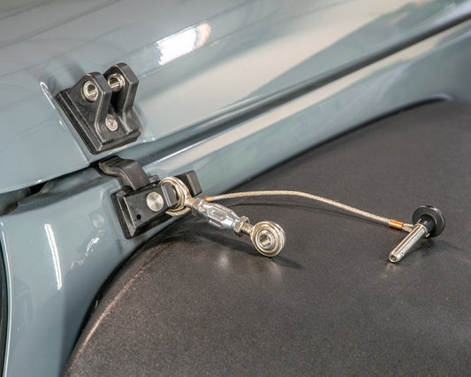 DV8 Offroad Jeep JK hood hold downs and pins for 2007-2018 models, secure hood latch hardware with durable metal construction.