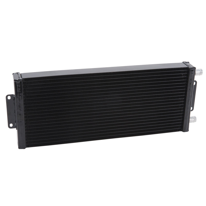 Black Edelbrock intercooler with dual pass design, 20x8x2 inches, rated at 20,500 Btu/hr for efficient heat exchange.