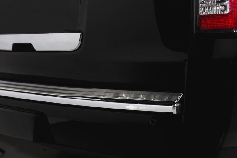 Putco stainless steel rear bumper cover on a 2007-2014 Chevrolet Suburban, durable steel bumper for truck rear protection.