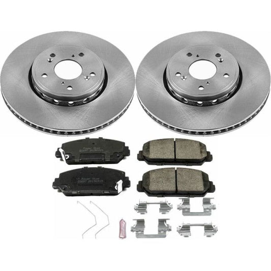 PowerStop OE front brake kit for 2016 Acura ILX, including brake rotors and pads, installed on vehicle.