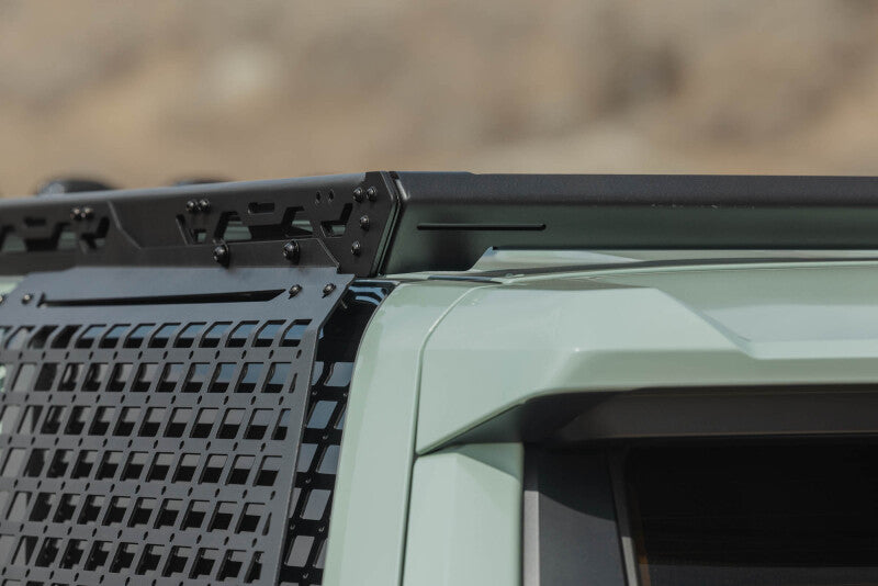 DV8 Offroad Toyota 4Runner exterior window Molle panel for DV8 roof rack driver side, durable black exterior trim accessory.