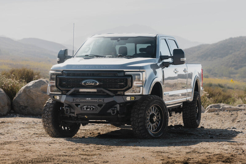 Steel front bumper for Ford Super Duty F-250/F-350 by DV8 Offroad, part of the Spec Series, rugged and durable for off-road use.