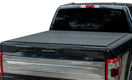 Access Tri-Fold Tonneau Cover for 2017-2024 Nissan Titan and Titan XD, hard fold bed cover in urethane carbon fiber finish.