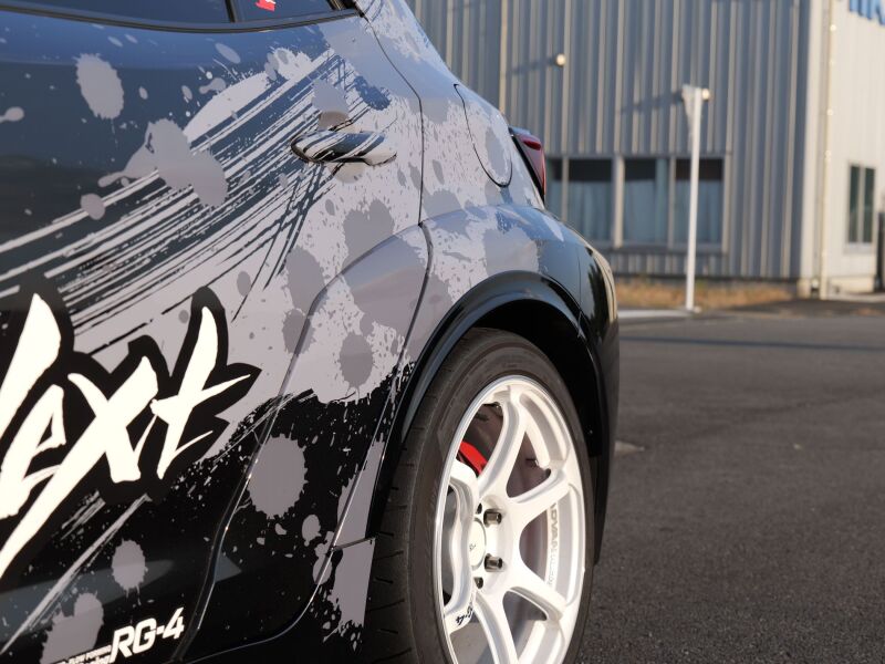 HKS GR Corolla GZEA14H fender molding from body kit, close-up view showing sleek design and fit on the vehicle's side.
