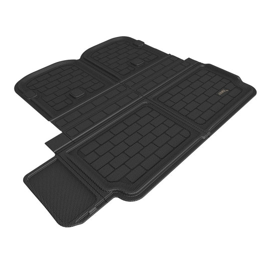 3D MAXpider black rubber cargo liner for Tesla Model X 2022 behind second row, designed to protect the vehicle floor.