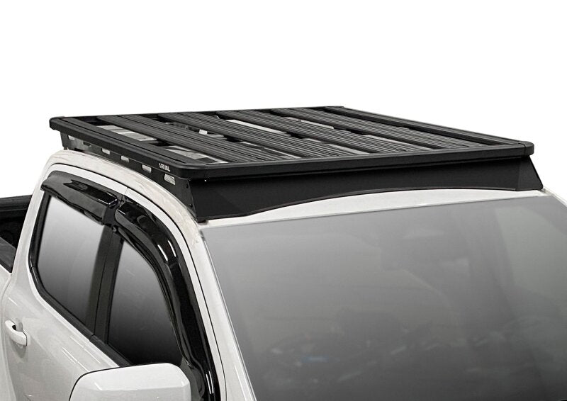 Rival 4x4 aluminum roof rack for Ford Ranger 24-26 and Ranger Raptor, mounted on vehicle roof for additional cargo space.