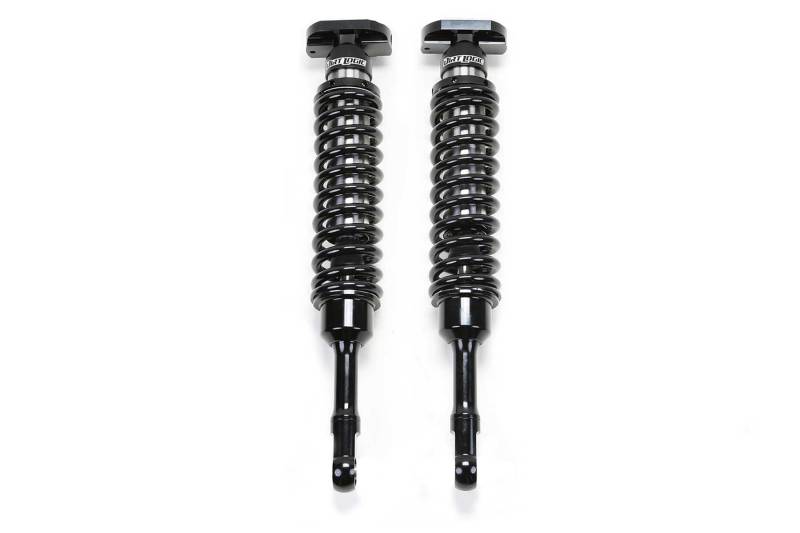 Pair of Fabtech 15-19 Toyota Tacoma Dirt Logic 2.5 N/R coilovers with 3-inch front lift, designed for 6-lug 2WD and 4WD trucks.