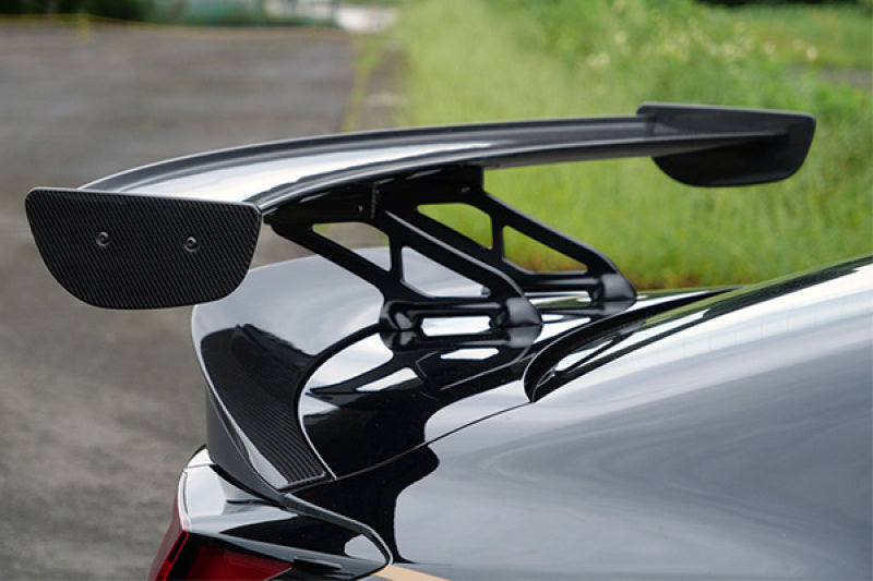 HKS TYPE-S GR86 side skirt body kit installed on a car, showcasing aerodynamic design and sleek styling details.