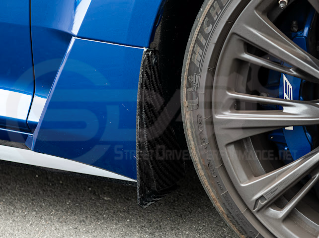 Pair of carbon fiber mud flaps for 2022-up Cadillac CT5-V Blackwing by Street Driven Performance, showing front and rear splash guards.