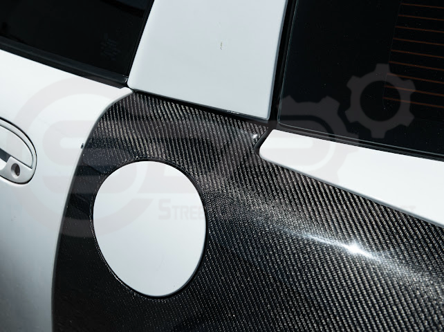 Factory style carbon fiber front and rear widebody fenders for 1997-2004 Chevrolet Corvette C5 hatchback by Street Driven Performance.
