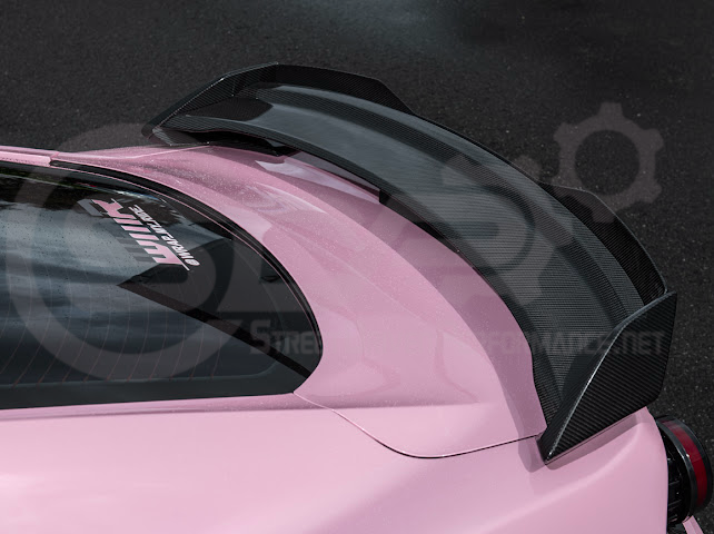 Dark Horse style carbon fiber rear wickerbill spoiler wing for 2015-2023 Ford Mustang, shown mounted on the vehicle's rear.