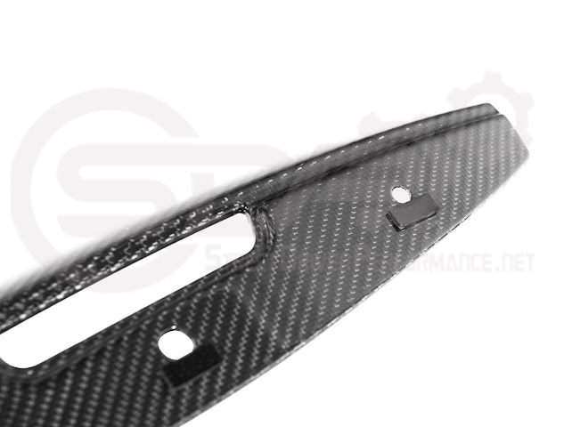 Cadillac CT5-V Blackwing factory OEM style carbon fiber front lip splitter and wheel arches, ground effects for enhanced performance.
