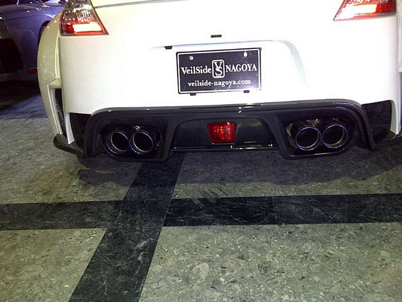VeilSide 2009-2023 Nissan 370Z Ver. I Model FRP with CARBON Accents Complete Kit (CFRP/ FRP) 6 Pieces Front Bumper, Pair of Side Skirts, Pair of Side Caps & Rear Bumper (Side Skirts Does Not Fit Nismo Model)