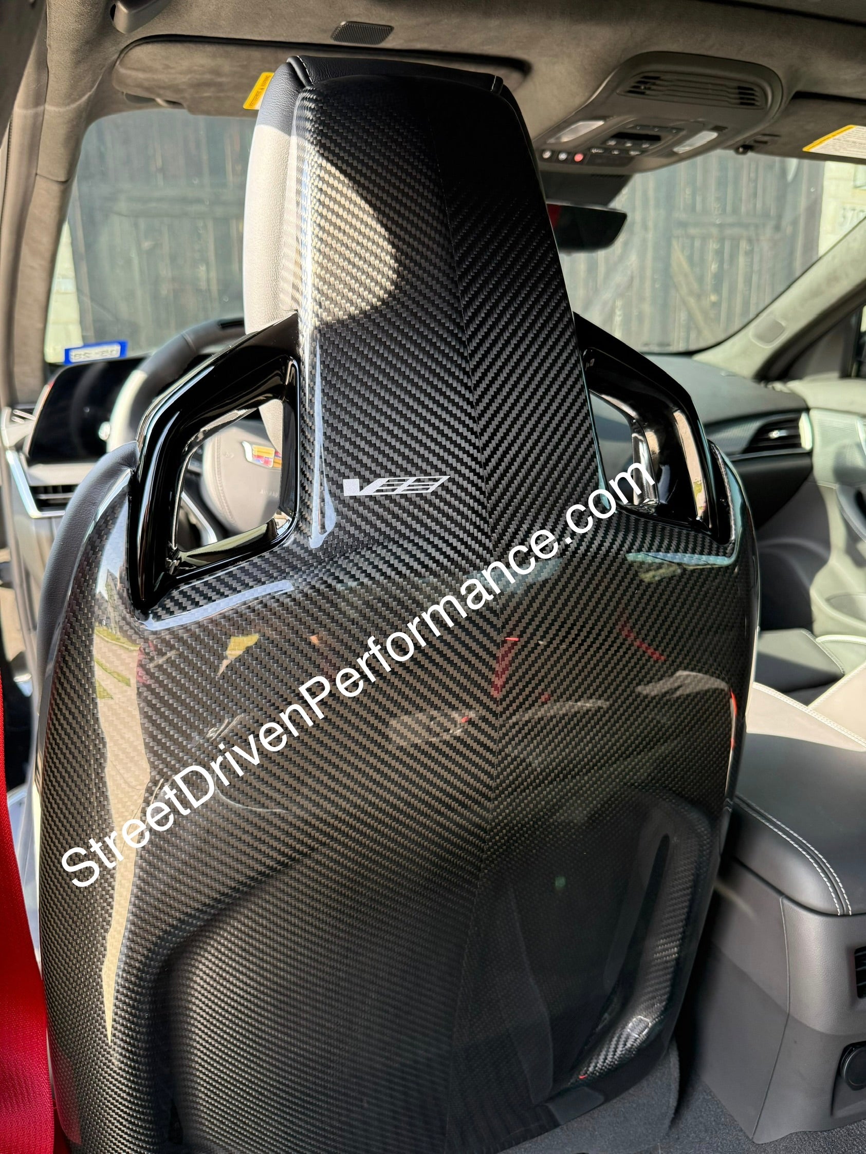 Pair of black carbon fiber seat back panels for Cadillac CT5-V and CT5-V Blackwing interior, driver and passenger side.