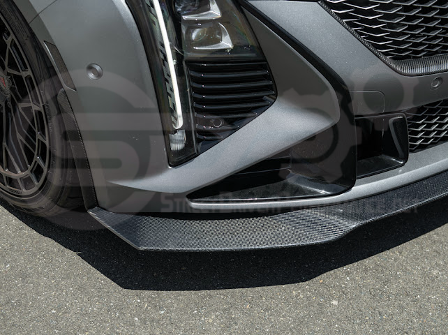 Cadillac CT5-V Blackwing factory OEM style carbon fiber front lip splitter and wheel arches, ground effects for sporty look.
