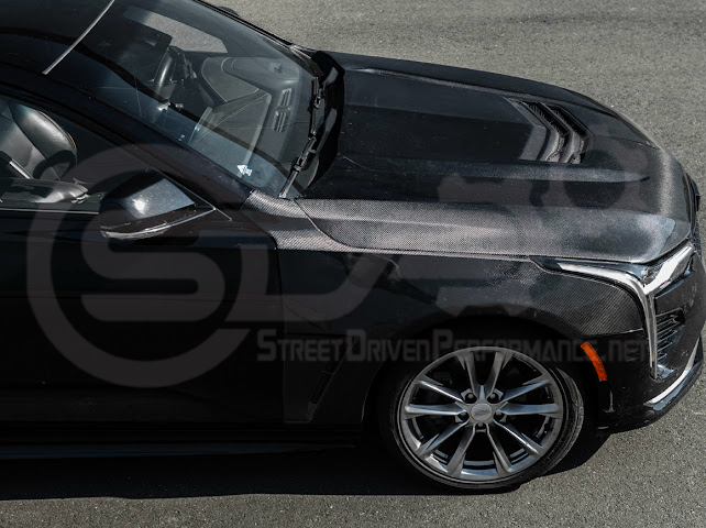 Black Wing style carbon fiber vented front hood for 2020+ Cadillac CT4, CT4-V, and CT4-V Black Wing from Street Driven Performance.