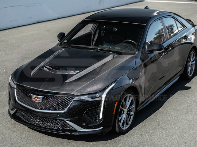 Black carbon fiber vented front hood for Cadillac CT4, CT4-V, and Black Wing models by Street Driven Performance.