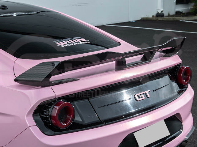 Dark Horse style carbon fiber rear wickerbill spoiler wing for 2015-2023 Ford Mustang, featuring sleek aerodynamic design.