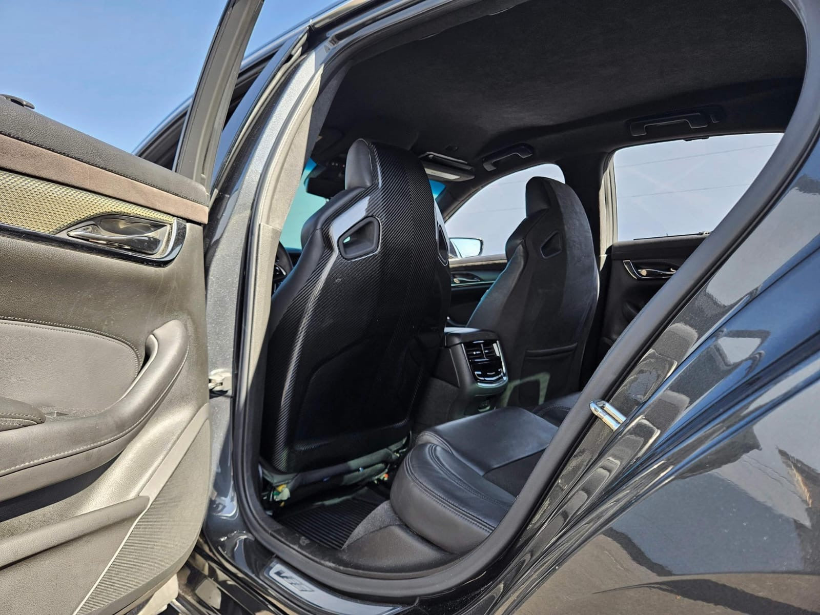 Cadillac ATS-V sedan Recaro carbon fiber seat rear panel cover replacement, driver and passenger side, Street Driven Performance.