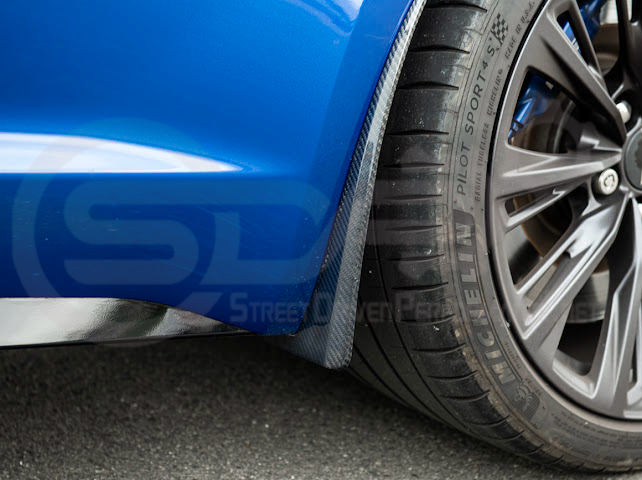 Pair of black carbon fiber mud flaps for 2022-up Cadillac CT5-V Blackwing, featuring sleek front and rear splash guards.