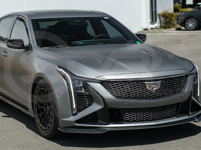 Cadillac CT5-V Blackwing factory OEM style carbon fiber front lip splitter and wheel arches, ground effects for enhanced sporty look.