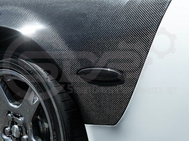 Factory style carbon fiber front and rear widebody fenders for Chevrolet Corvette C5 1997-2004 by Street Driven Performance.