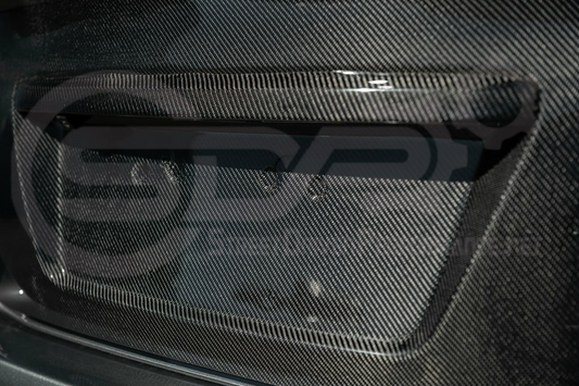 Carbon fiber rear trunk lid with integrated spoiler wing for 2015-2021 Subaru WRX STI, featuring a blemished, discounted SDP open box trunk.