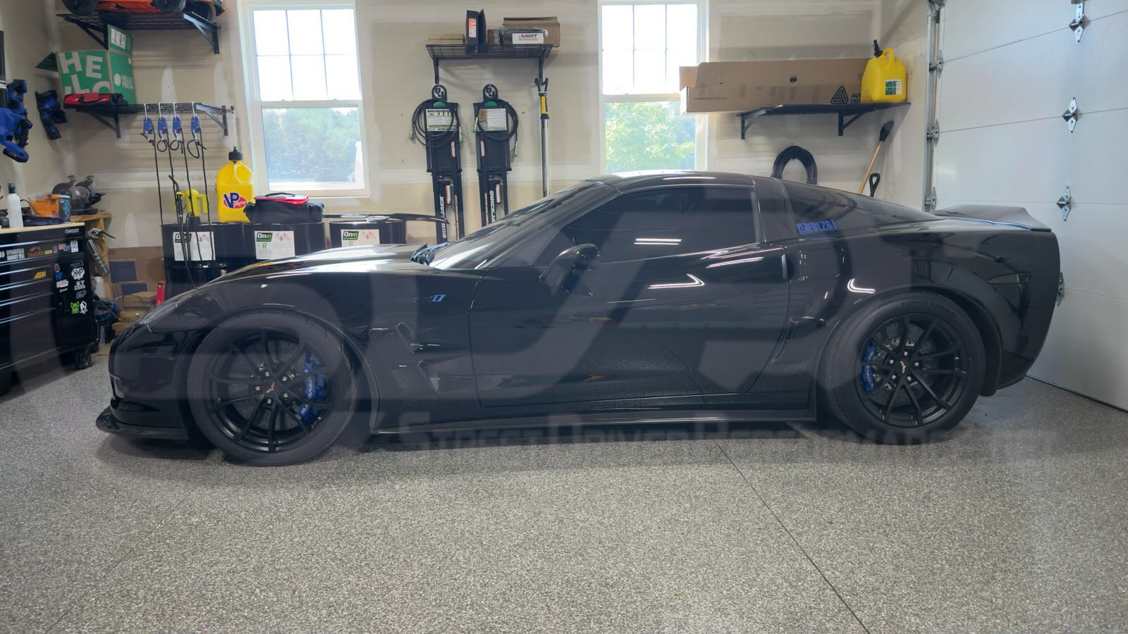Carbon fiber rear trunk lid wing spoiler for 2005-2013 Chevrolet Corvette C6, aggressive style by Street Driven Performance.