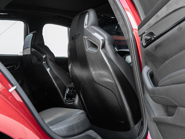 Recaro carbon fiber seat rear panel cover replacement for 2016-2019 Cadillac ATS-V Sedan, driver and passenger side, by Street Driven Performance.