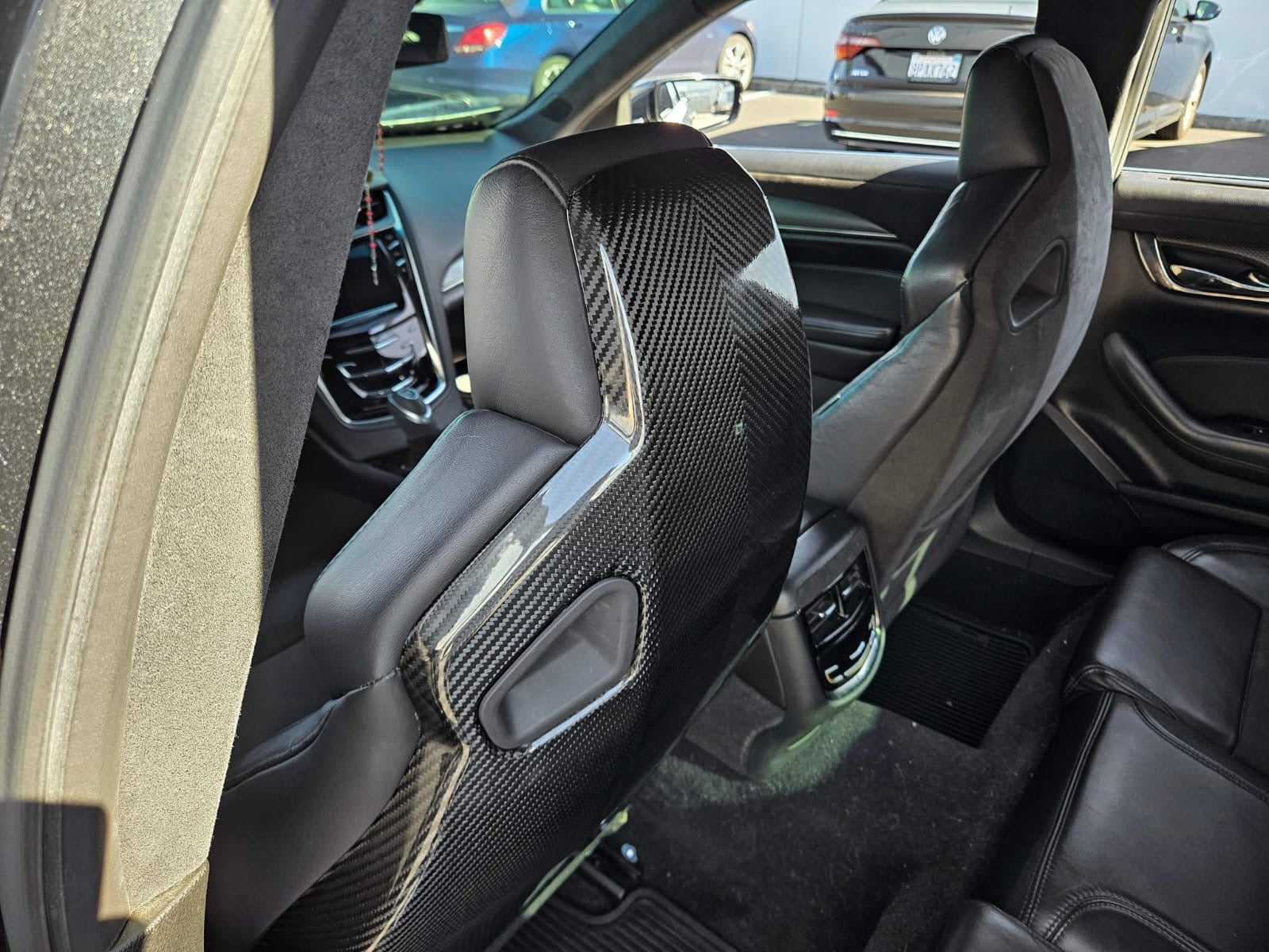 Cadillac ATS-V sedan Recaro carbon fiber seat rear panel cover replacement for driver and passenger seats, by Street Driven Performance.