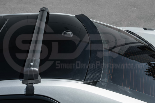 Cadillac CTS-V 2003-2008 Street Driven Performance carbon fiber top window roof spoiler wing on car's rear window.