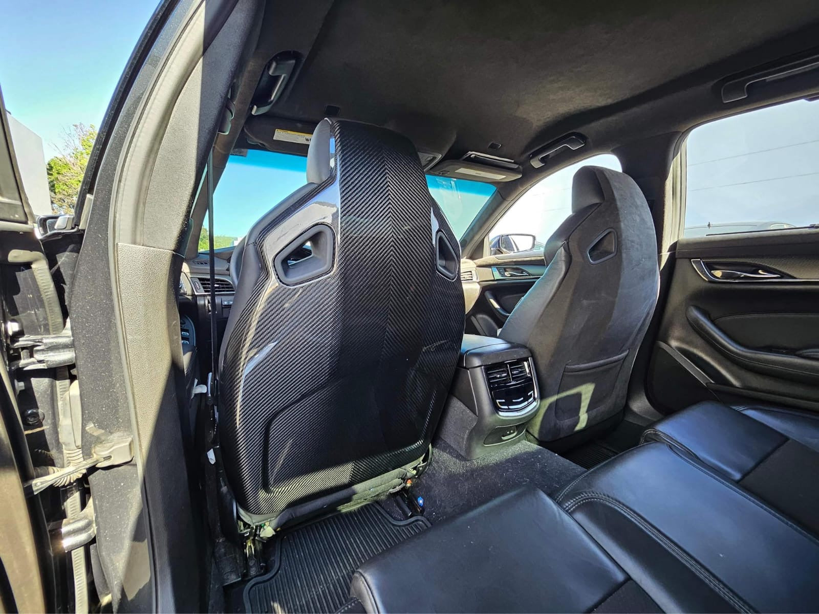 Recaro carbon fiber seat rear panel cover for 2016-2019 Cadillac ATS-V sedan, driver and passenger side, by Street Driven Performance.