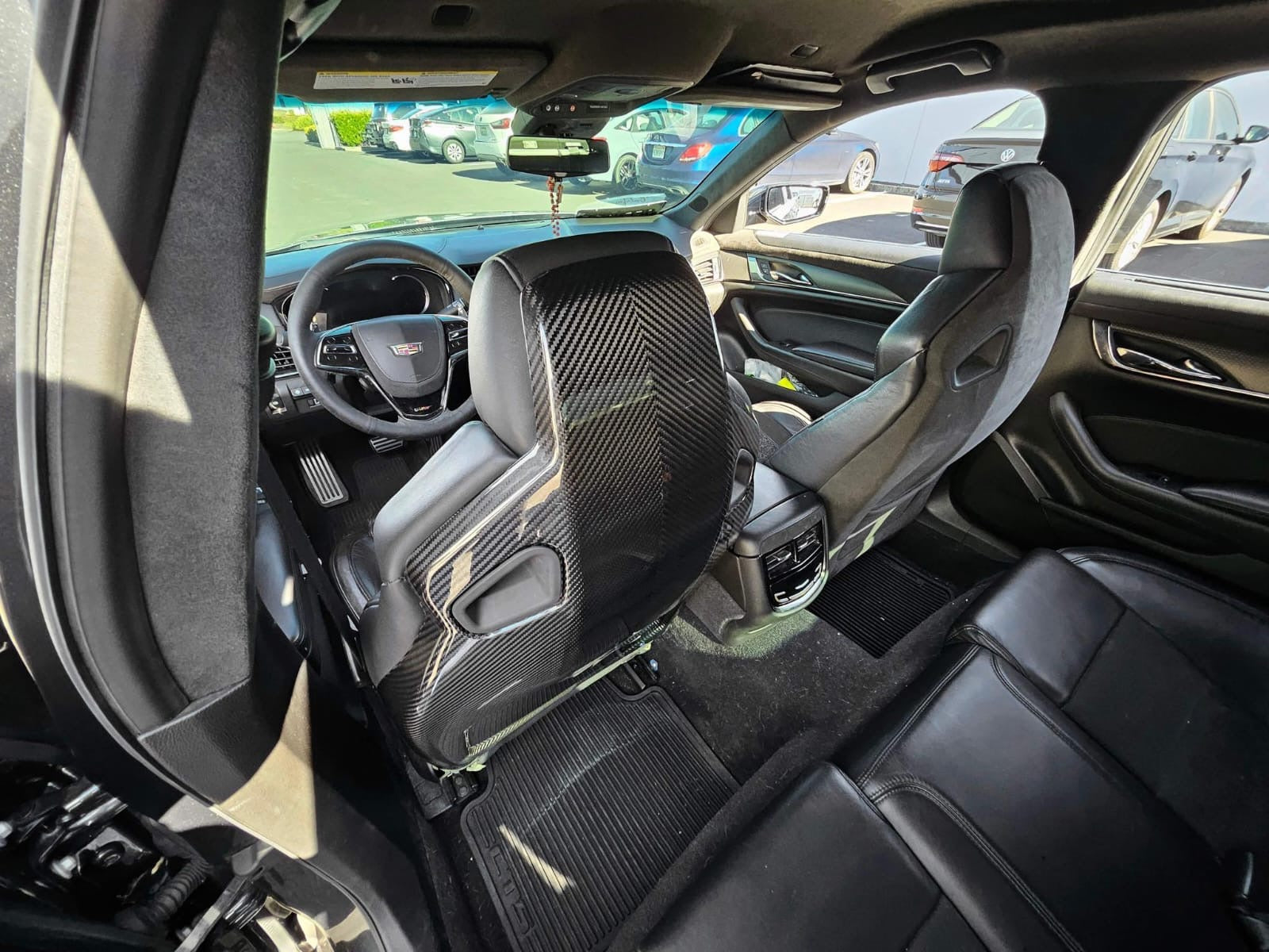 Recaro carbon fiber seat rear panel cover for 2016-2019 Cadillac ATS-V sedan, driver and passenger side, by Street Driven Performance.