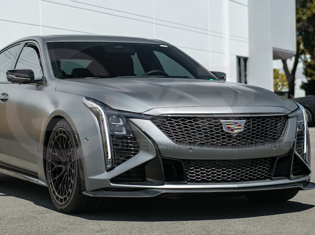Cadillac CT5-V Blackwing factory OEM style carbon fiber front lip splitter and wheel arches, ground effects for enhanced performance.