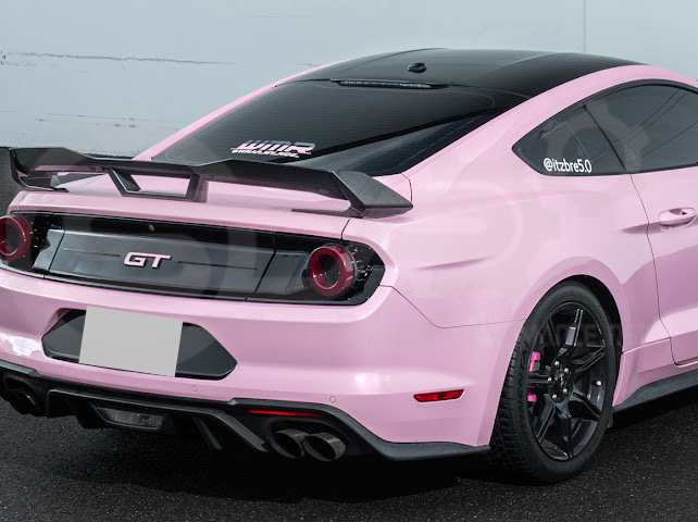 Dark Horse style carbon fiber rear wickerbill spoiler wing on a 2015-2023 Ford Mustang, designed for enhanced aerodynamics and sporty look.