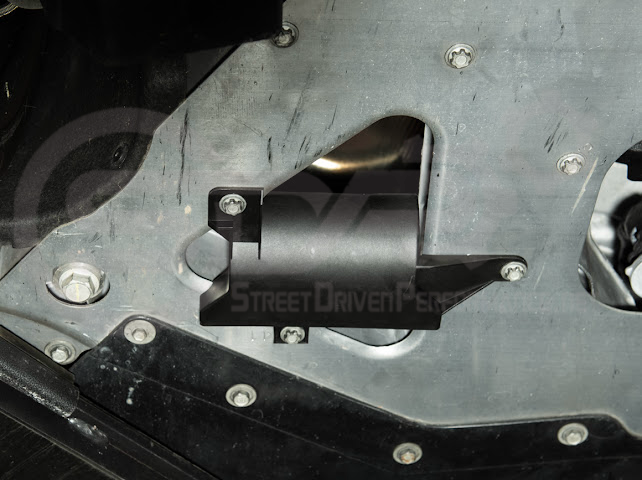 Pair of Street Driven Performance Chevrolet Corvette C8 underbody air deflector cooling duct scoops, exterior trim for improved airflow.