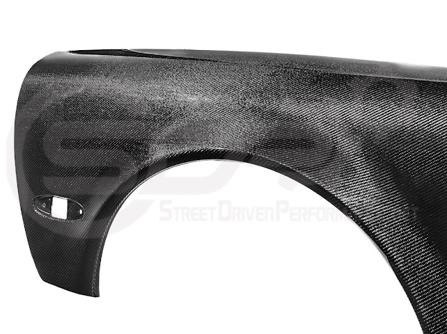Factory style carbon fiber front and rear widebody fenders for 1997-2004 Chevrolet Corvette C5 hatchback by Street Driven Performance.
