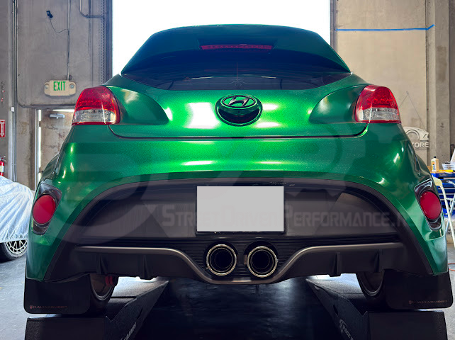 Hyundai Veloster Turbo 2013-2018 exhaust axle back with dual 4-inch muffler delete, featuring burnt tips or chrome finish.