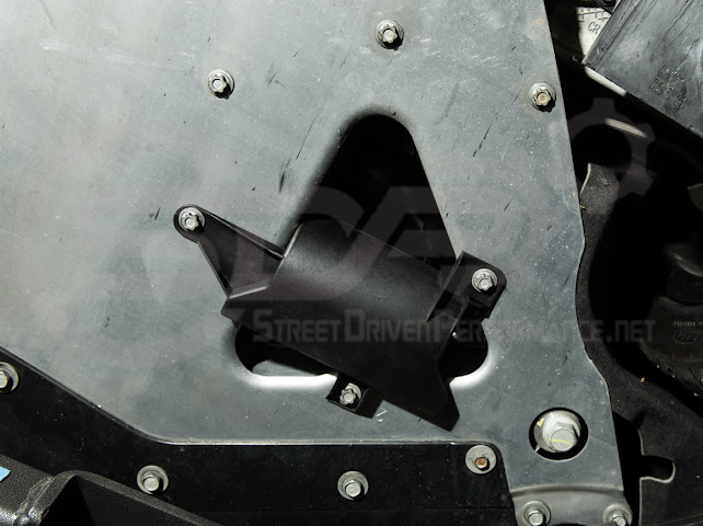 Pair of Street Driven Performance Chevrolet Corvette C8 underbody air deflector cooling duct scoops, exterior trim for enhanced airflow.
