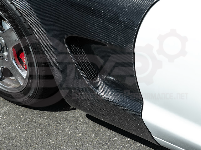 Factory style carbon fiber front and rear widebody fenders for 1997-2004 Chevrolet Corvette C5 hatchback by Street Driven Performance.
