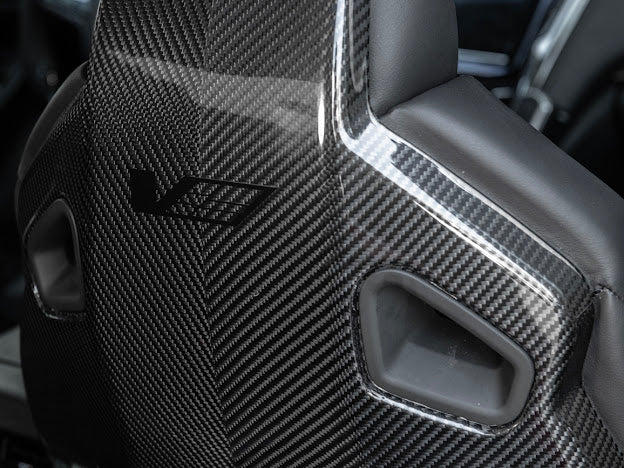 Cadillac ATS-V sedan Recaro carbon fiber seat rear panel covers for driver and passenger, by Street Driven Performance.