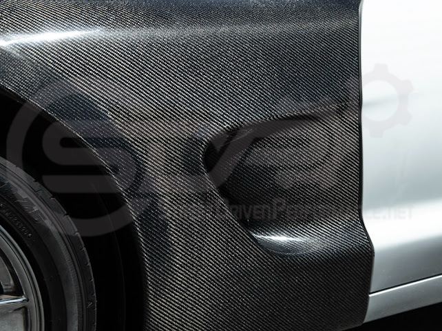 Factory style carbon fiber front and rear widebody fenders for 1997-2004 Chevrolet Corvette C5 hatchback by Street Driven Performance.